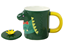 Attēls no Vaikiškas keraminis puodelis su šaukštu ir dangteliu, dinozauras, žalia